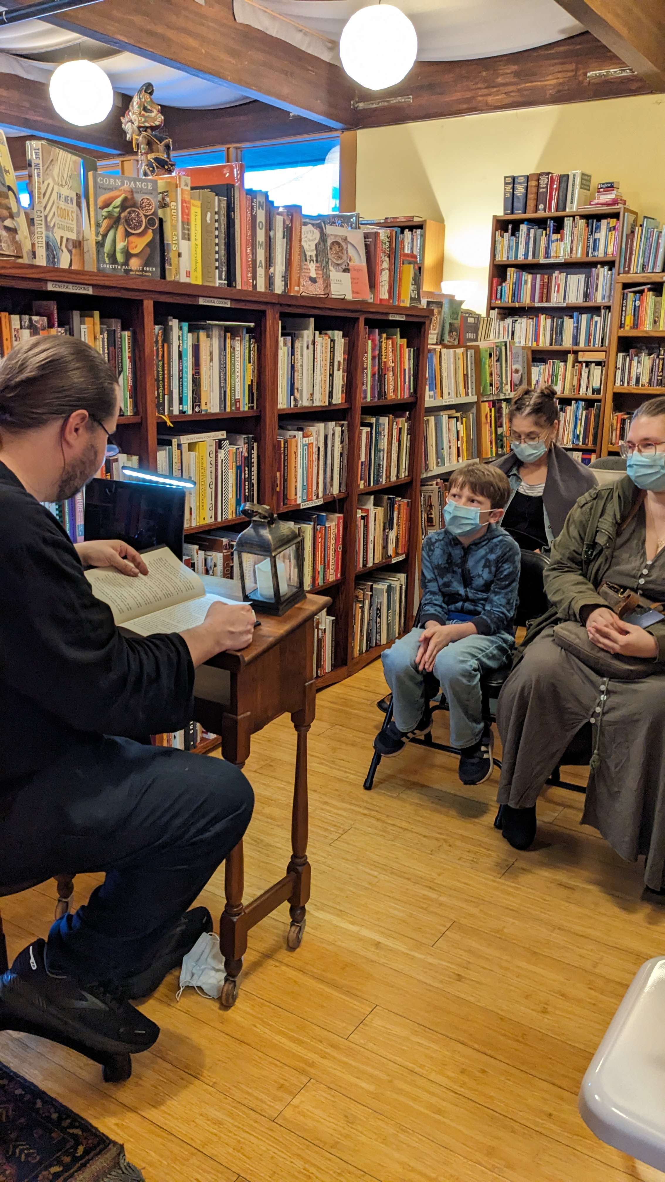 The audience listening to author T.H. Lehnen reading from Fog & Fireflies at Chaparral Books, April 4, 2024.